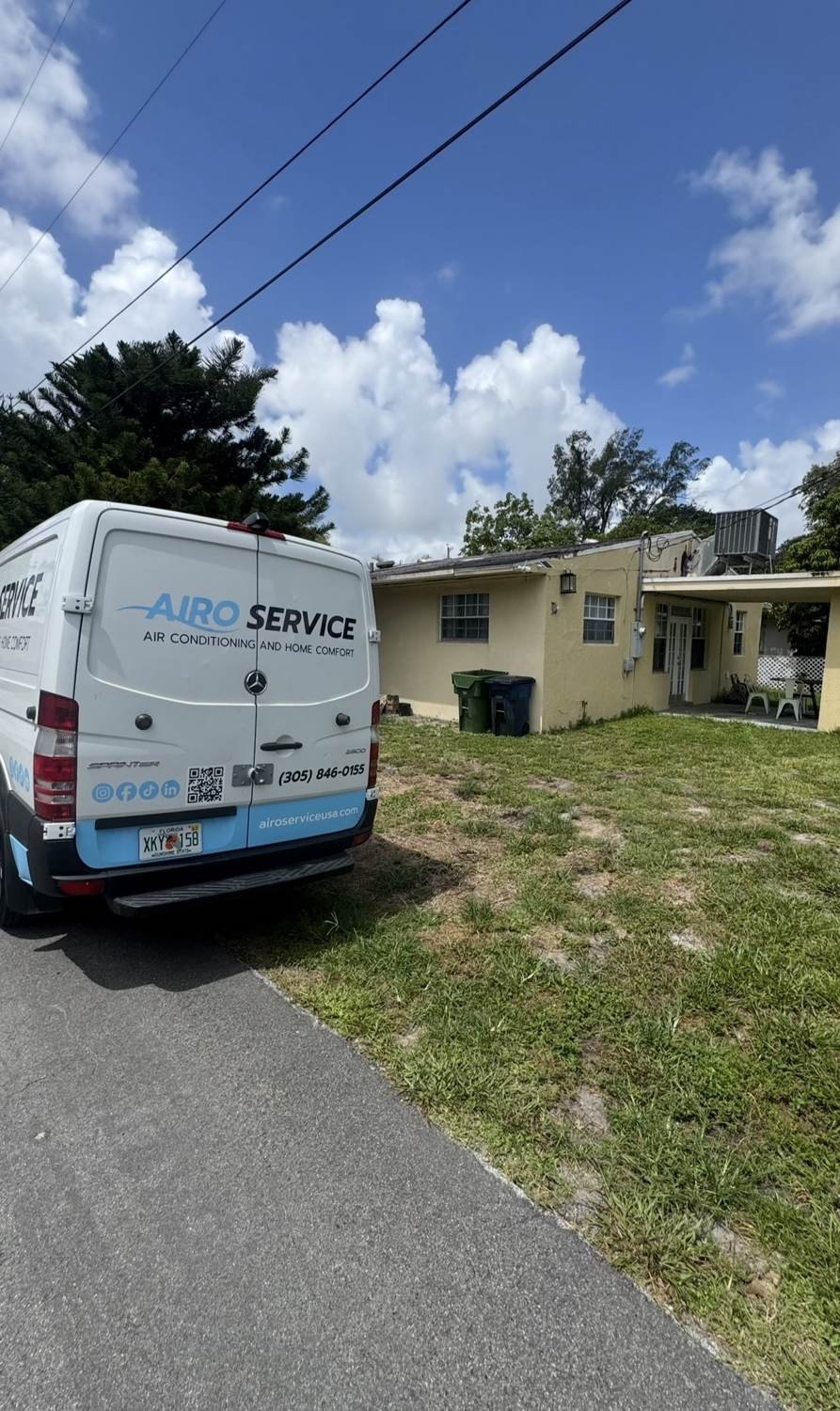 Airo Service van in a residential neighborhood